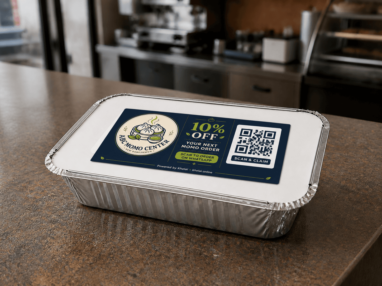 ABC Momo Center offer sticker on an aluminium takeaway tray